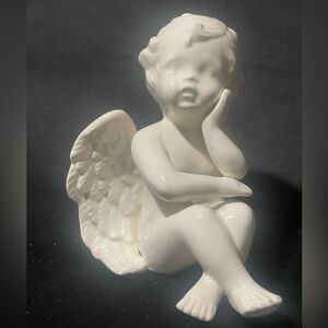 White Ceramic Cherub Statue
